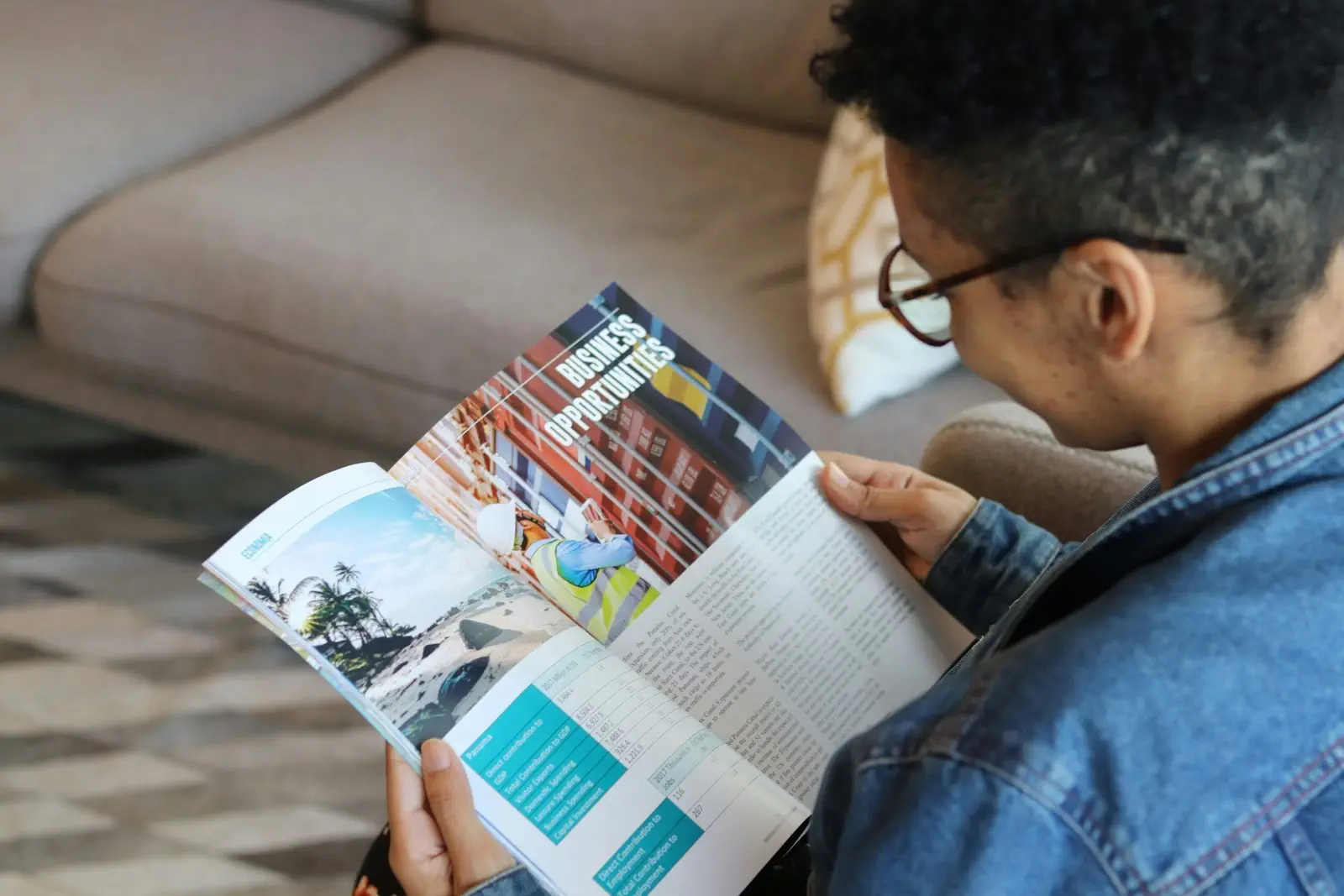 A man reading an article on business opportunities.